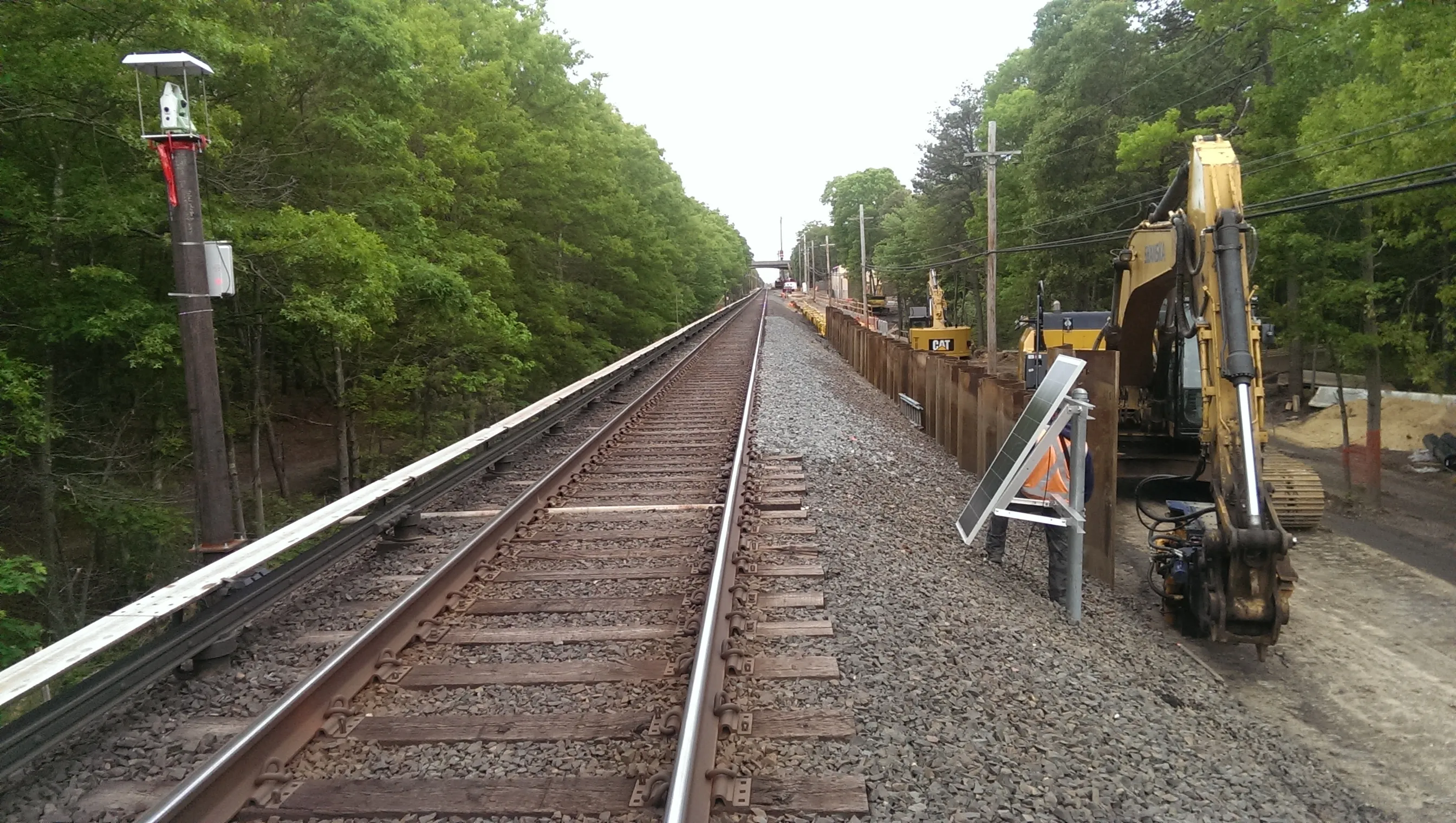 Active rail corridor beside construction work